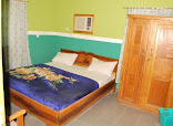 Plateau State Polytechnic Co-operative Guest House restaurant photo 2 showing dining area and food