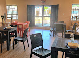 Surulere Resturant restaurant photo 2 showing dining area and food