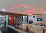 Tina Jay Restaurant restaurant photo 2 showing dining area and food
