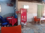 Yaga"s Kitchen plus restaurant photo 2 showing dining area and food